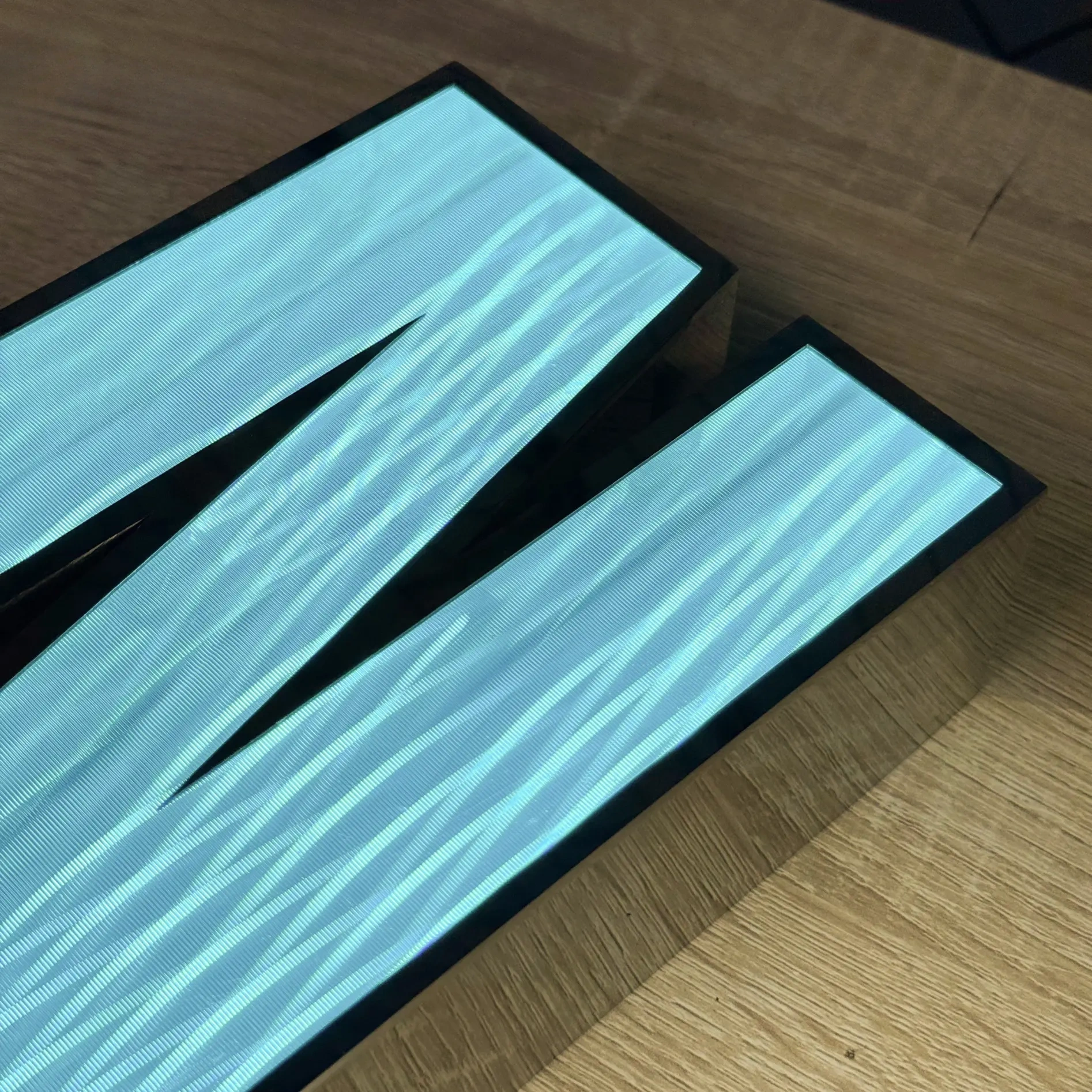Signage team checking LED light strips